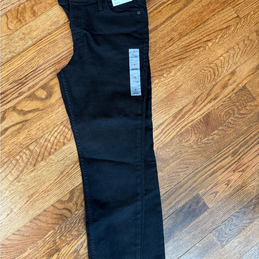 Woman’s black old navy skinny jeans